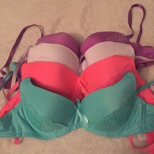 four multicolored bras